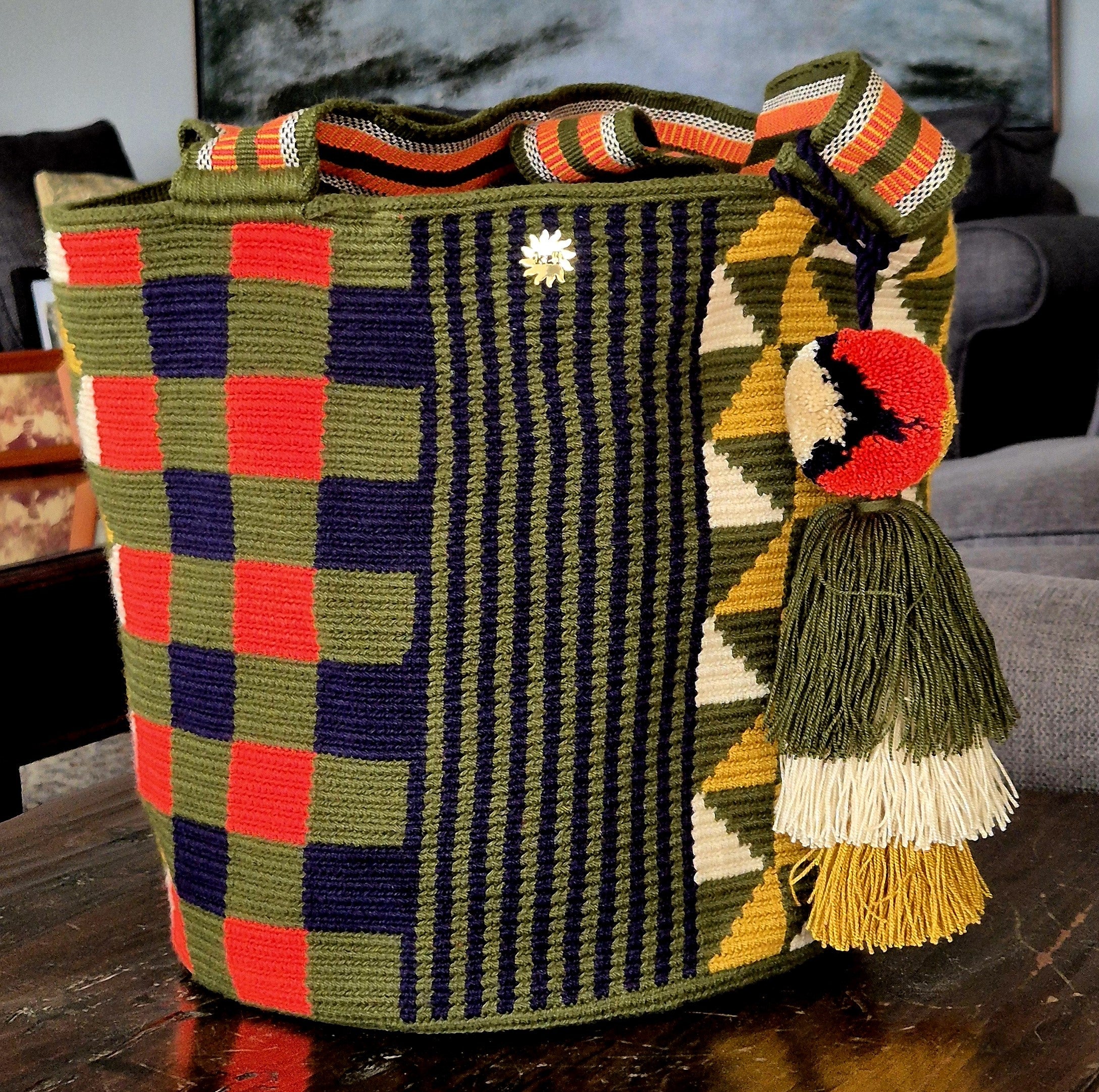 Olive wallet with vertical lines and navy blue checks, fuchsia checks, beige triangles, mustard and olive green