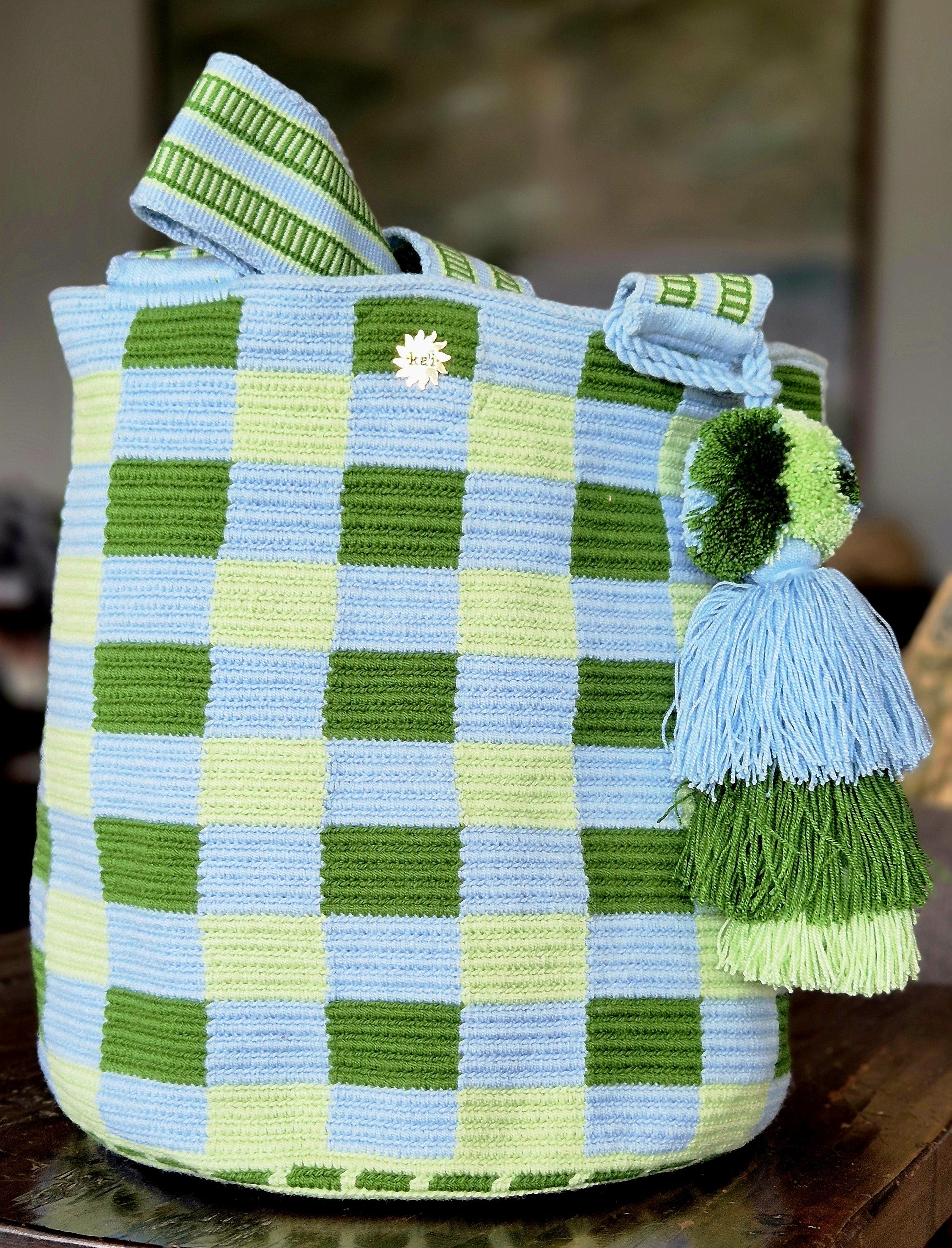 Wallet in a turquoise, green and apple blue check pattern