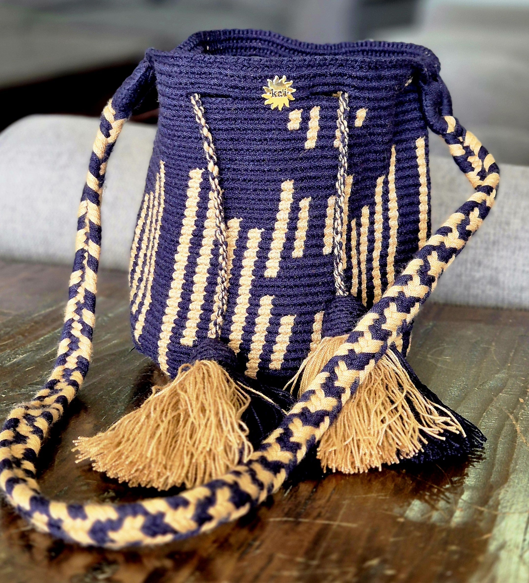 Navy blue wallet with khaki vertical stripes