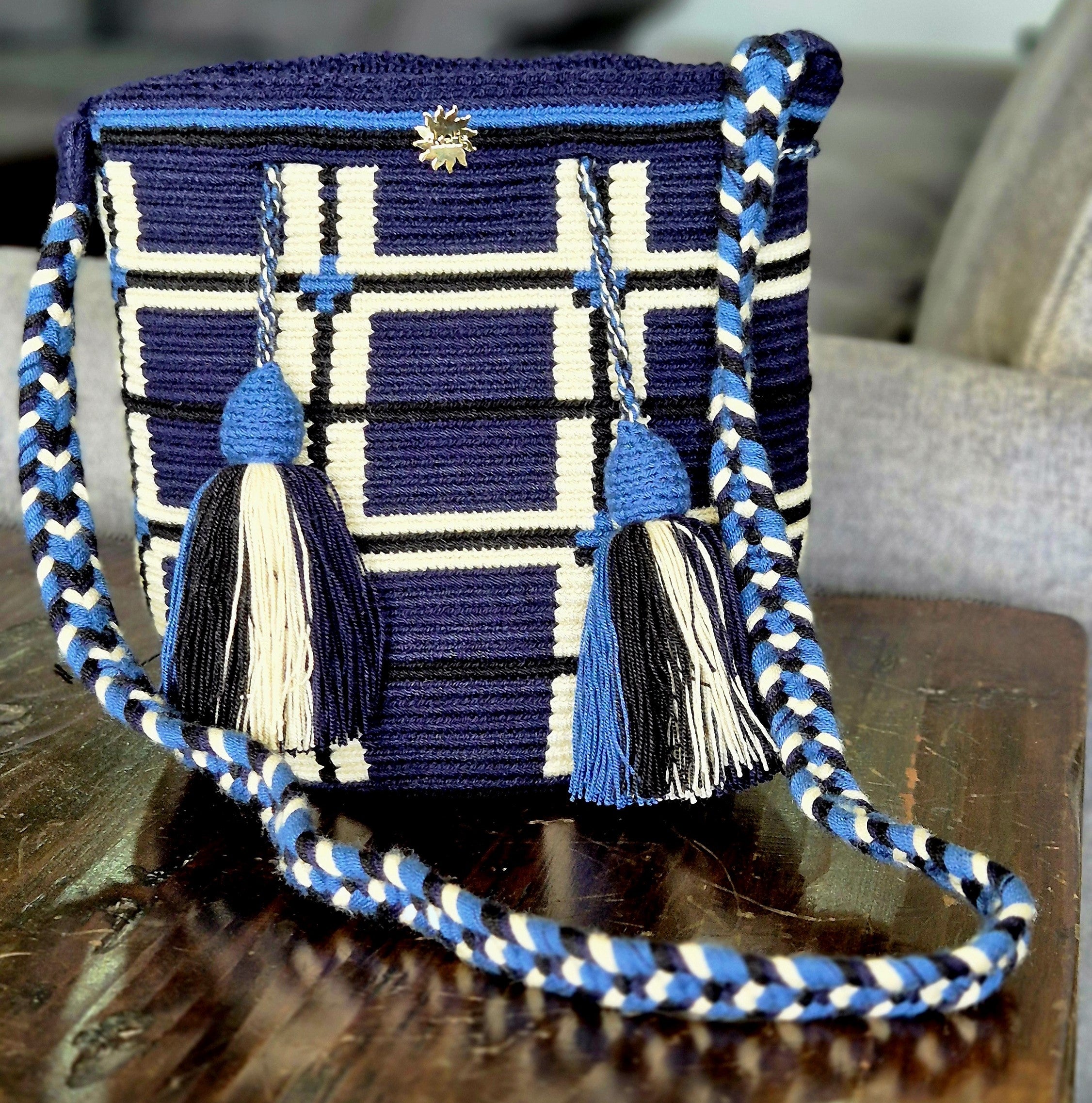 Blue wallet with black and white square lines