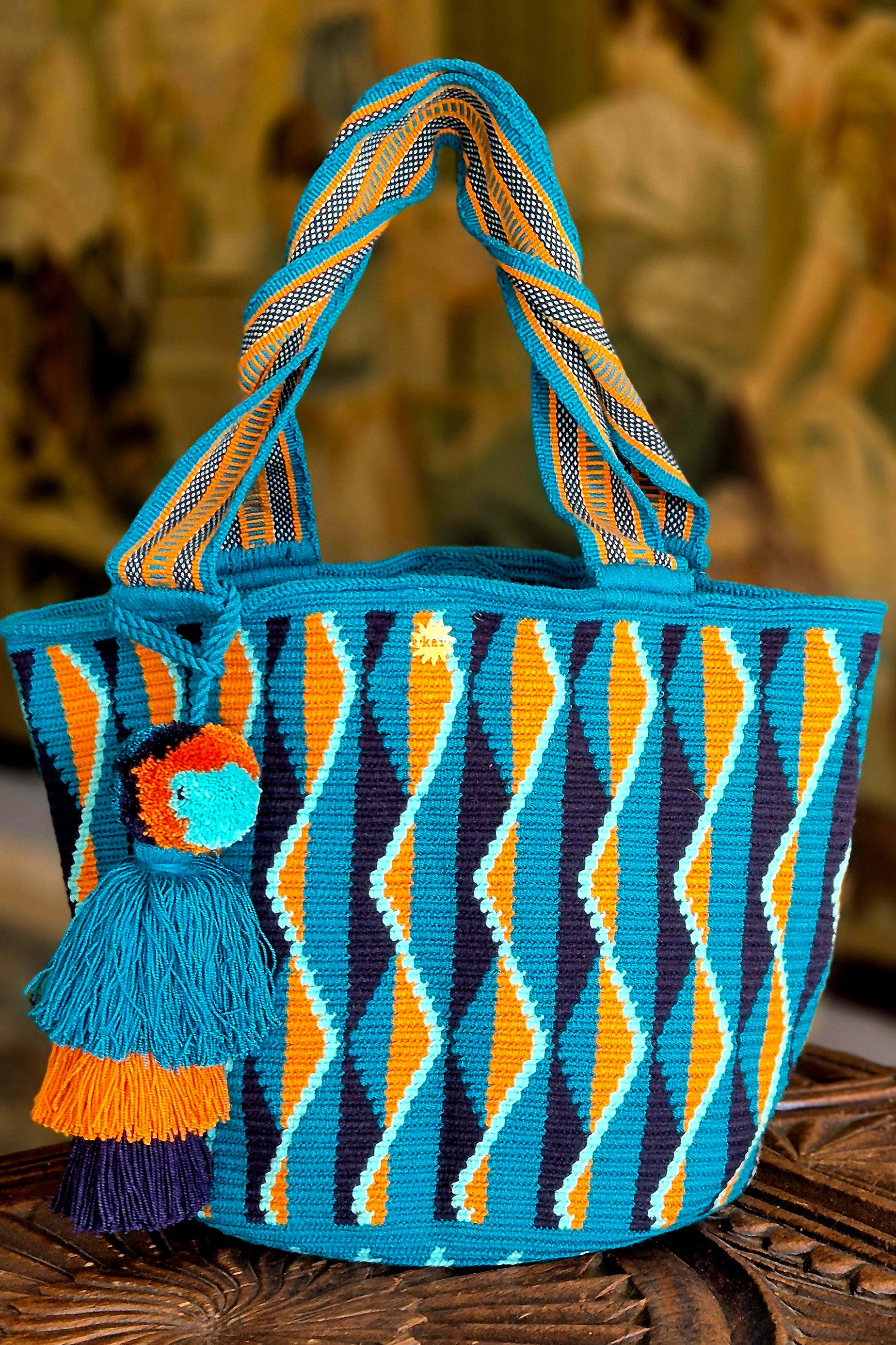 Aquamarine wallet with vertical waves in mustard, navy and light blue